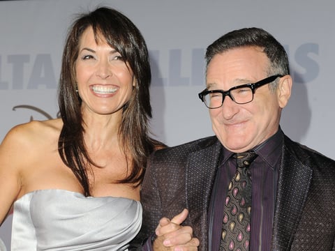  This Nov. 9, 2009 file photo shows actor Robin Williams, right, and his wife Susan Schneider at the premiere of "Old Dogs" in Los Angeles. 